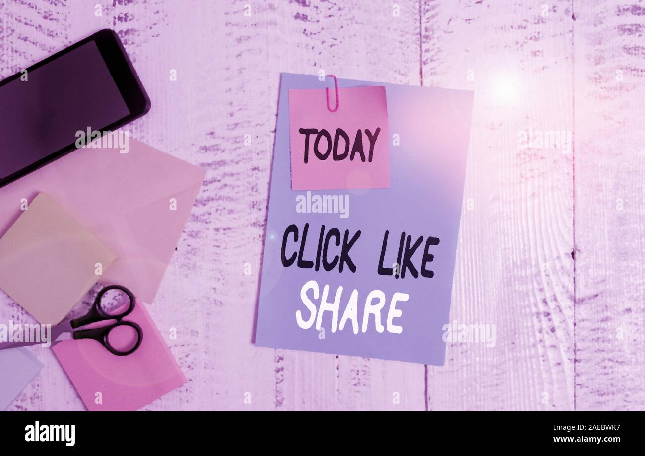 Writing note showing Click Like Share. Business concept for