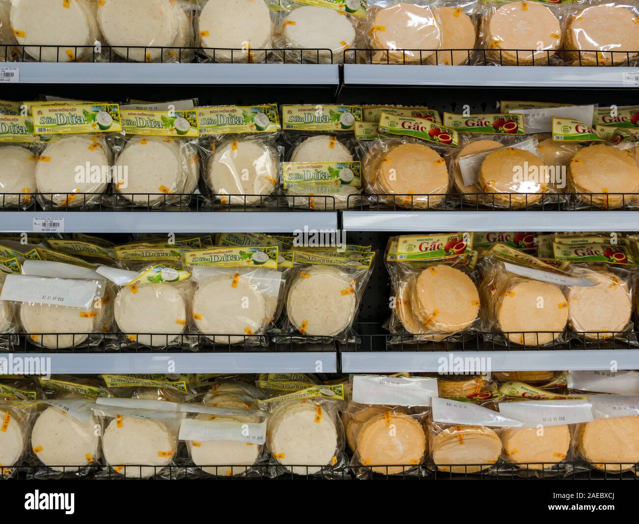 Packets of Bánh phồng fried rice crackers on supermarket shelf, Vietnam, Asia Stock Photo