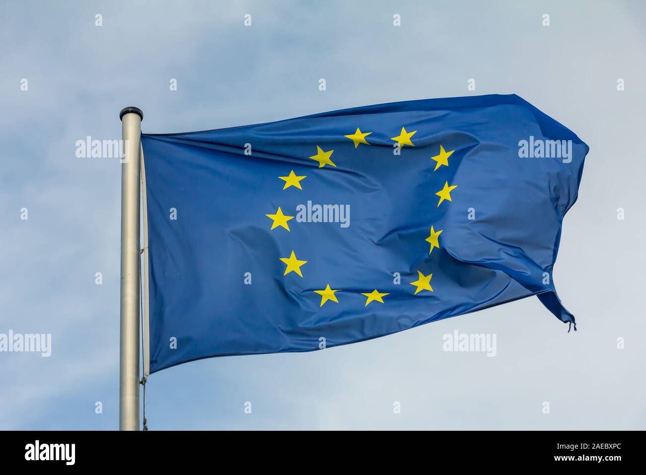 EU, Europe, European Union flag waving on blue sky background Stock ...