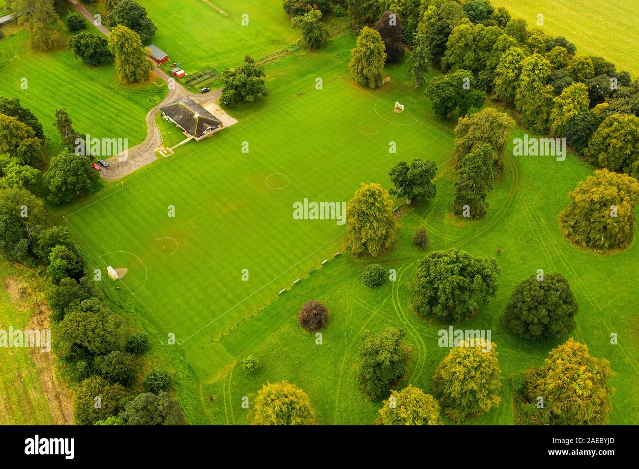 Aerial view of the Castle Leod shinty pitch, home of Caberfeidh Shinty Club, near Strathpeffer, Easter Ross, Scotland. Stock Photo