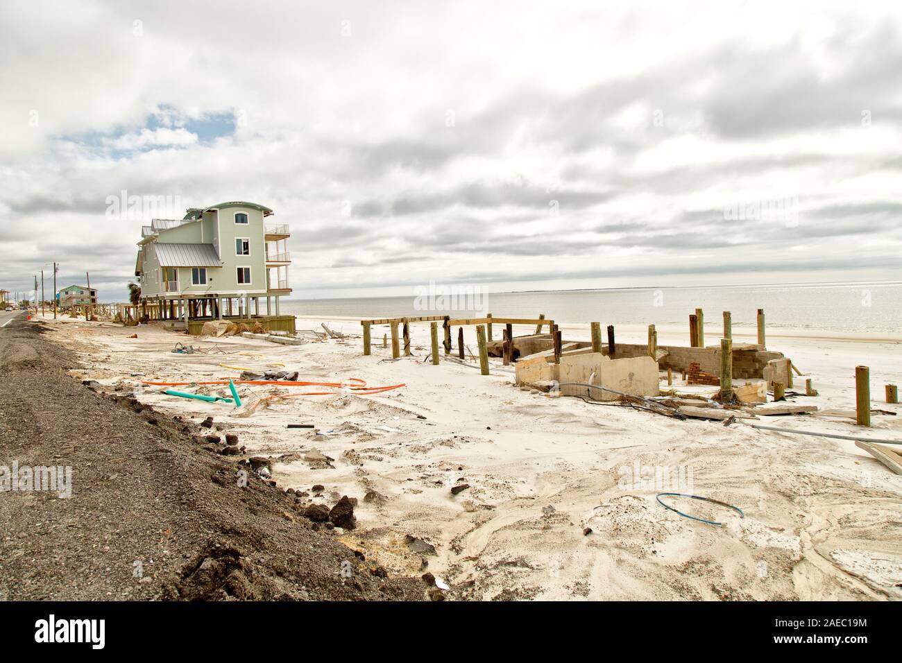 Vacant beachfront  property with remaining underpinning foundations from lost homes,  resulting from Hurricane  'Michael' 2018 destruction. Stock Photo