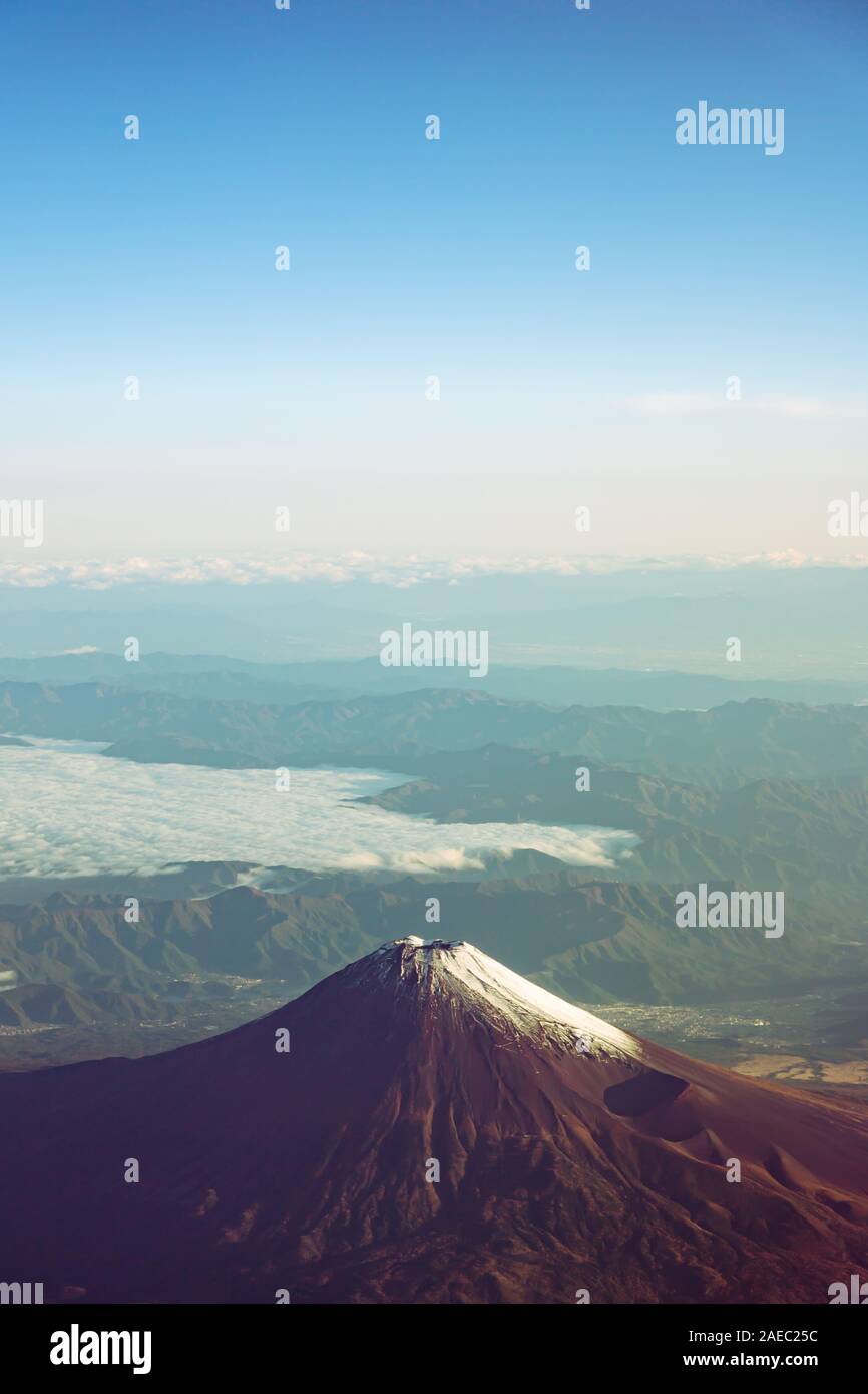 A birds eye view close-up the Mount Fuji ( Mt. Fuji ) and blue sky. Scenery landscapes of the Fuji-Hakone-Izu National Park. Shizuoka Prefecture, Jap Stock Photo