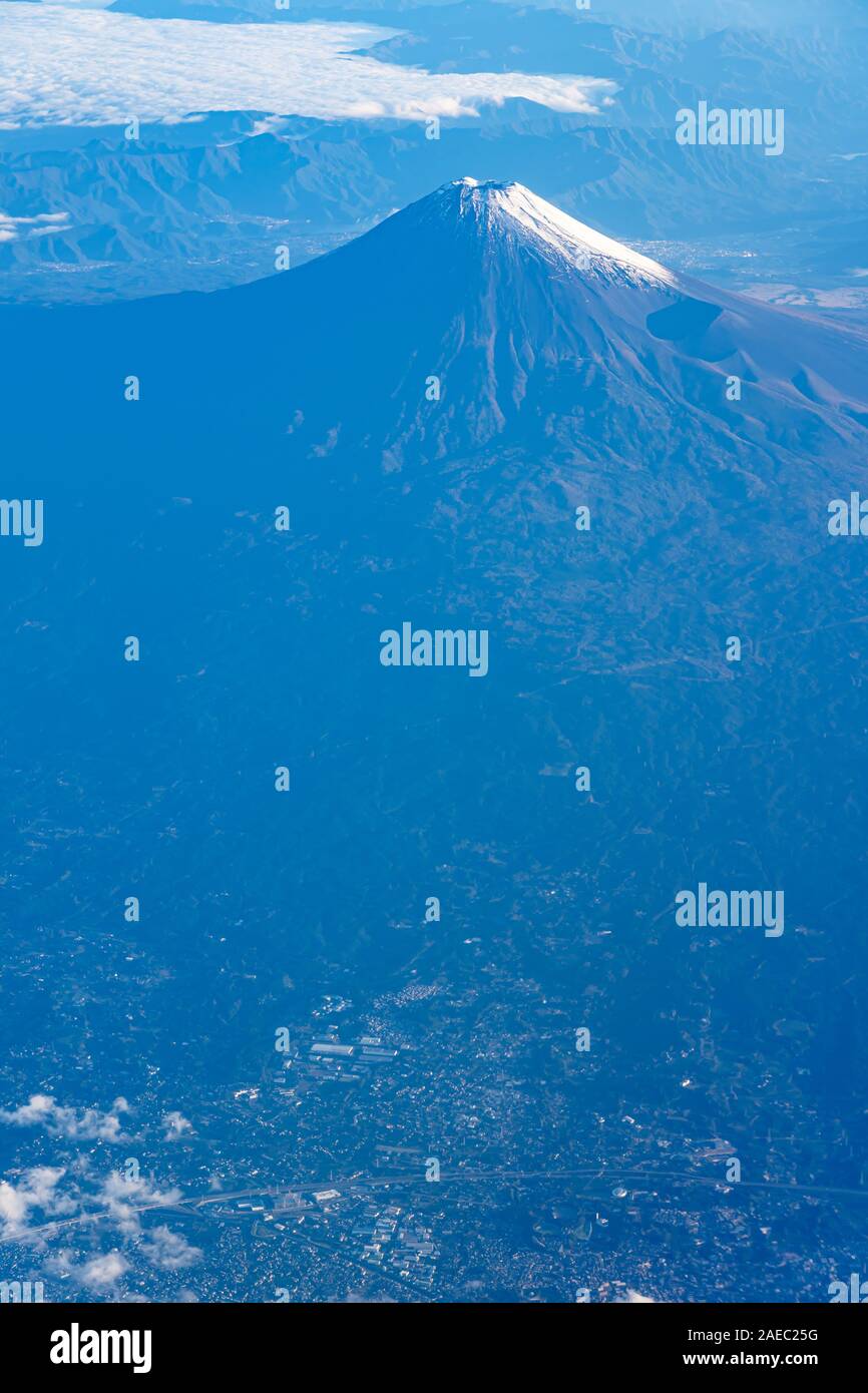 A birds eye view close-up the Mount Fuji ( Mt. Fuji ) and blue sky. Scenery landscapes of the Fuji-Hakone-Izu National Park. Shizuoka Prefecture, Jap Stock Photo