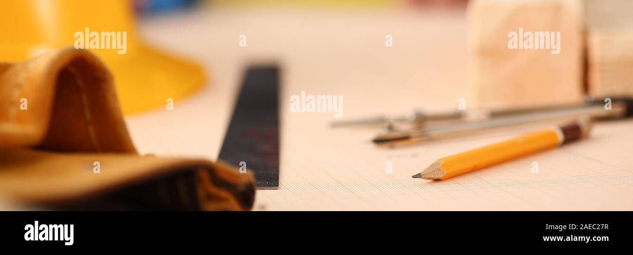 Arms of worker measuring wooden bar closeup Stock Photo Alamy