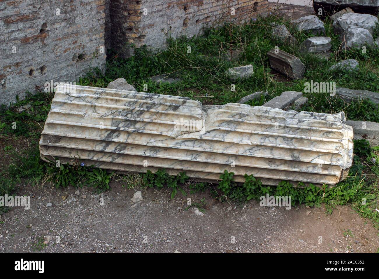 Ancient Roman ruin of a marble column at Forum Romanum in Rome, Italy Stock Photo