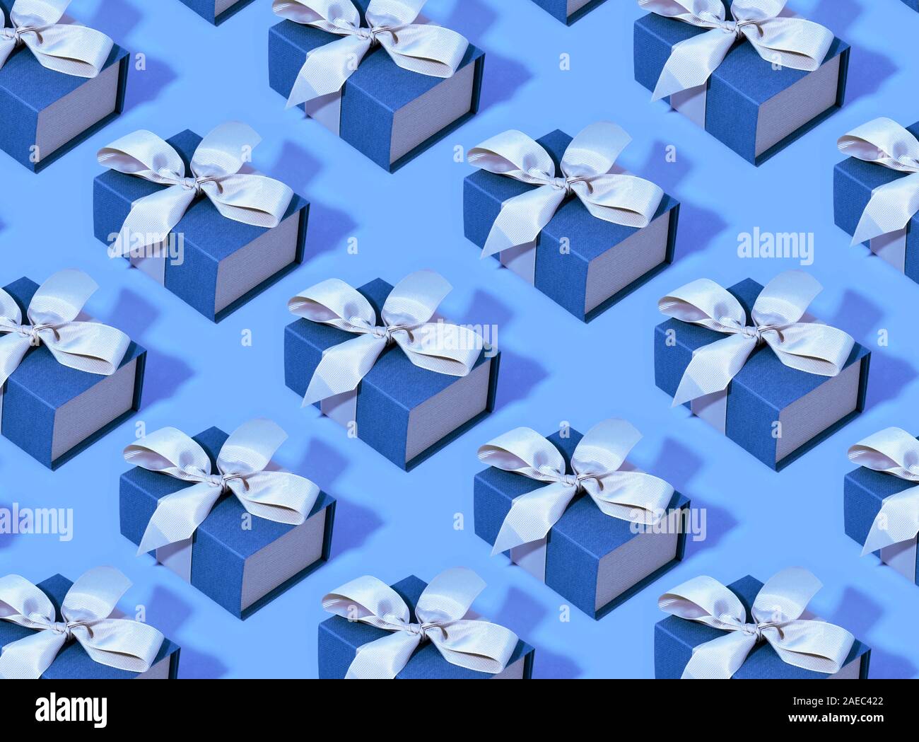 Pattern made of blue gift boxes on pastel background Stock Photo - Alamy