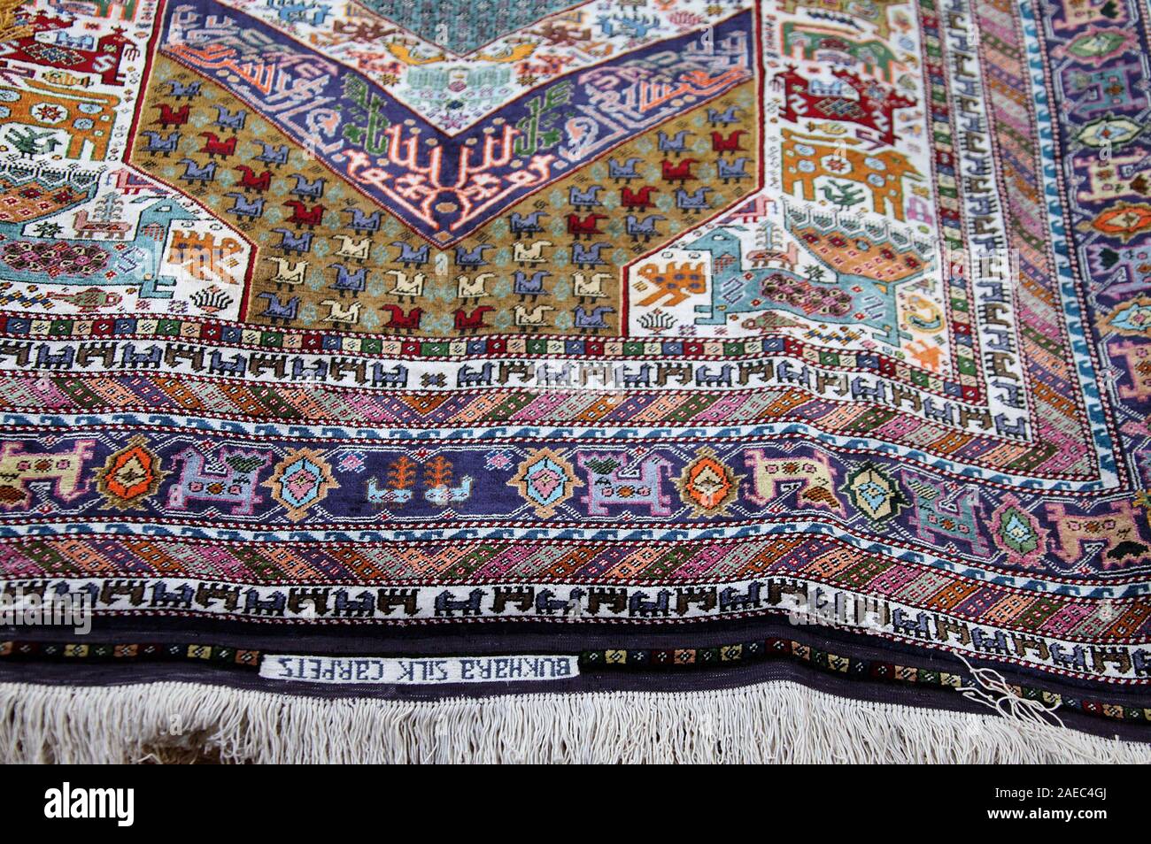 Handmade silk carpet for sale in Bukhara Stock Photo