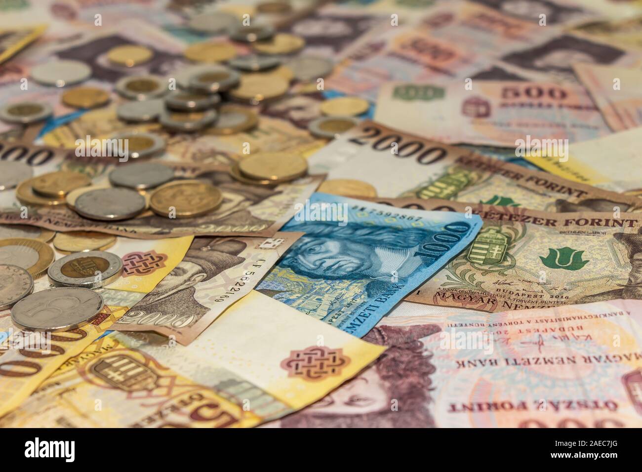 A composition of Hungarian forint. HUF banknotes and coins providing great options to be used for illustrating subjects as business, banking, media, p Stock Photo