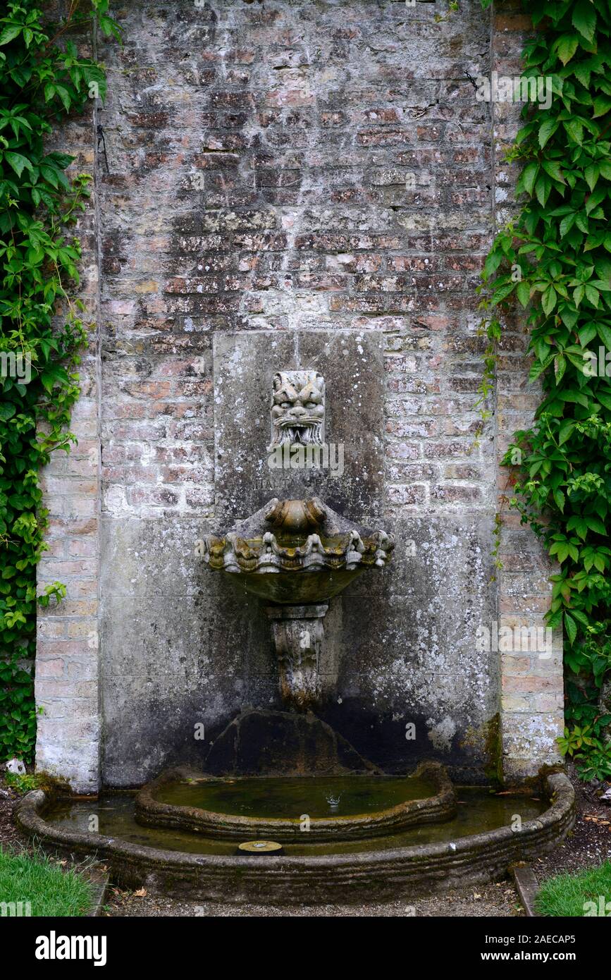 lions head fountain,stone fountain,water feature,garden feature,classic,classical,neo-classical,wall,walled garden,gardening,RM Floral Stock Photo