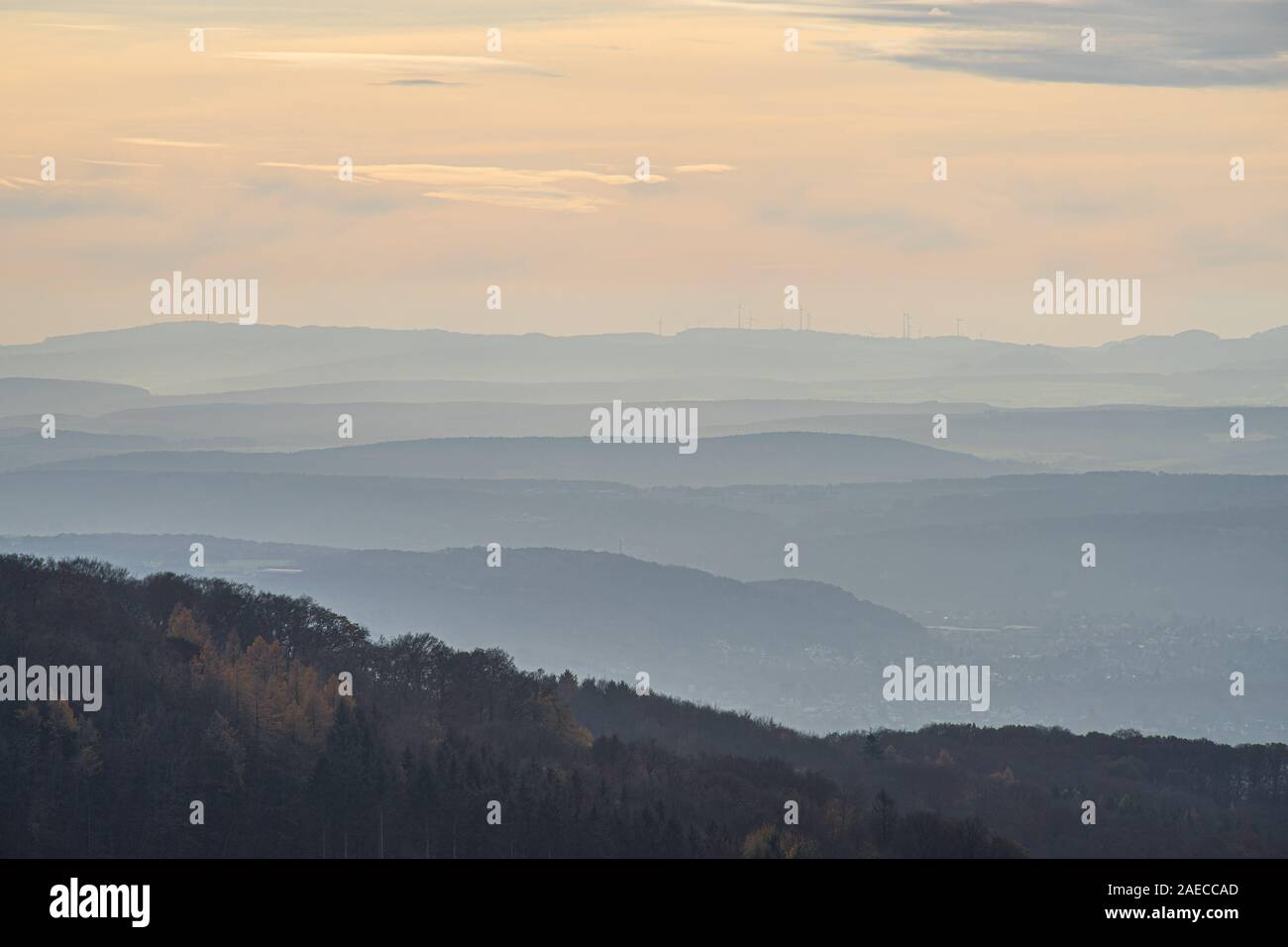 View over the hills at river Rhine in the light of an autumnal late afternoon sun. November Scene. Stock Photo