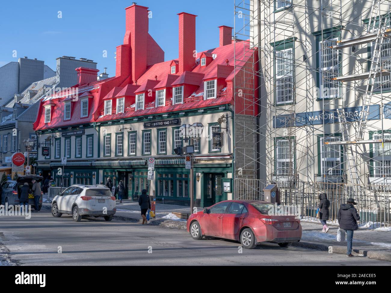 Quebec City, Quebec, Canada -- November 30, 2019. A photo of a side street in Quebec (rue St. Anne) with the popular red roofed Bistro 1640. Stock Photo