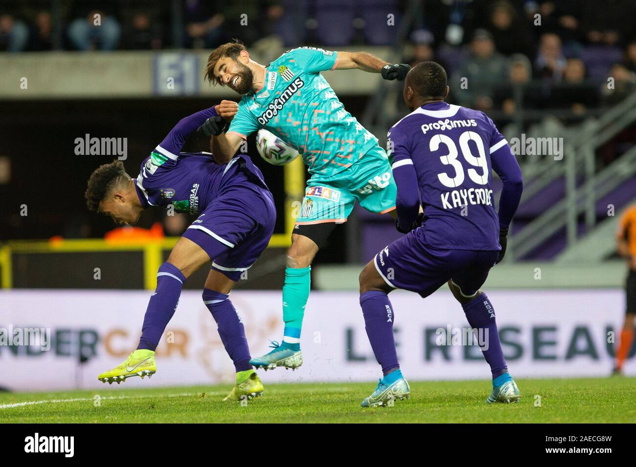 BRUSSELS, BELGIUM - December 08: Jeremy Doku of Anderlecht and Maxime Busi  of Charleroi fight for the ball during the Jupiler Pro League match day 18  between Rsc Anderlecht vs Sporting Charleroi