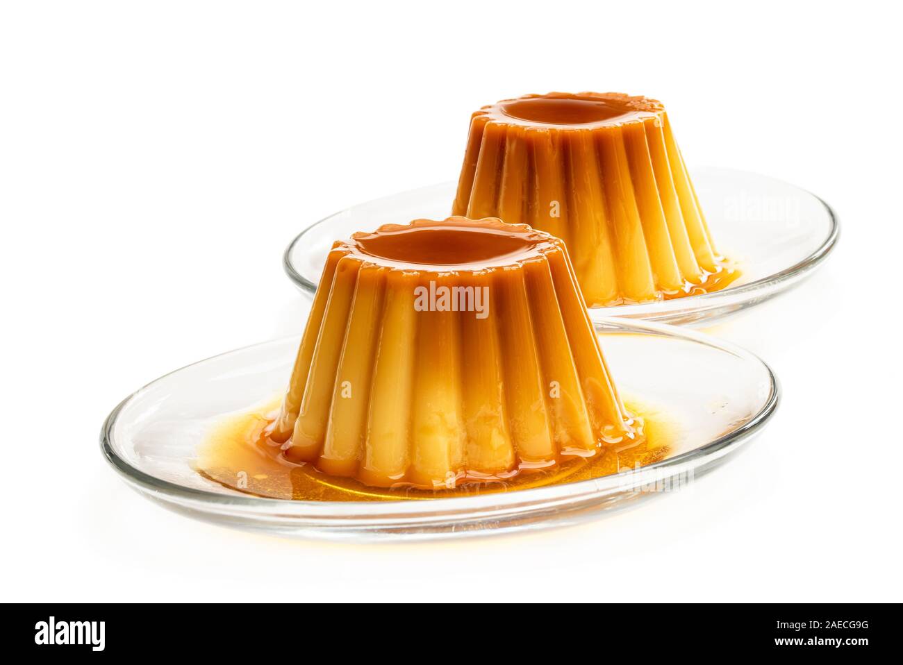 Creme caramel custard pudding isolated in white Stock Photo Alamy