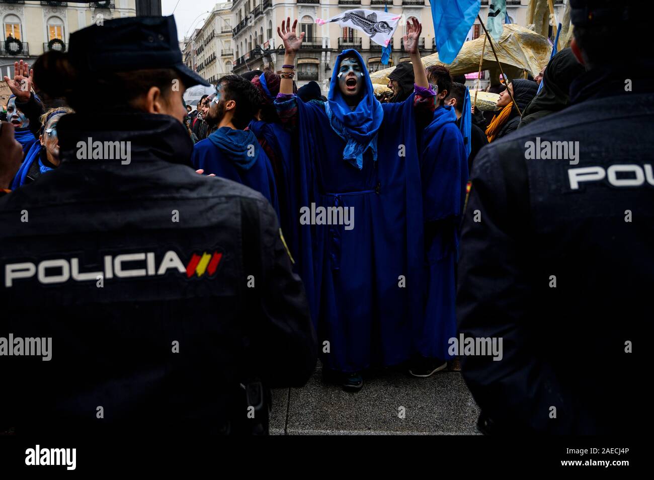 Madrid, Spain. 8th December, 2019. ÔExtinction Rebellion activistÕ performing the ÔMarch of the Dead OceansÕ, a protest to condemn the loss of marine biodiversity coinciding with the UN Climate Change Conference COP25 that is taking place in Madrid. Credit: Marcos del Mazo/Alamy Live News Stock Photo
