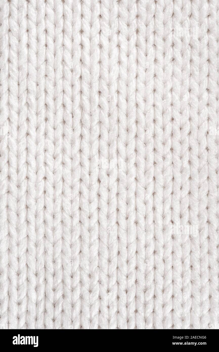 White Knit Fabric Background. Wool Sweater Texture Close Up Stock Photo