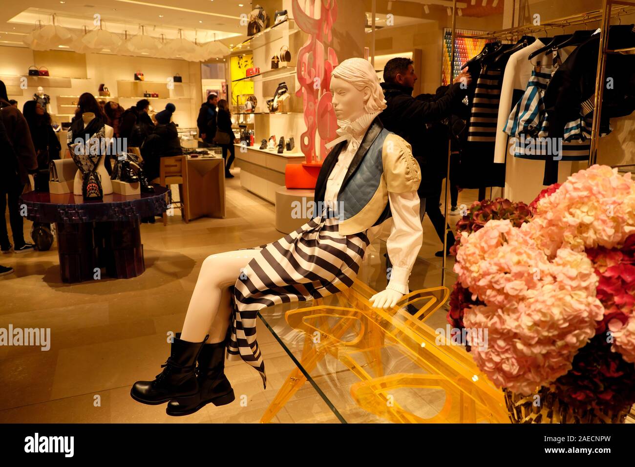 Louis Vuitton luxury store interior and people shopping shoppers inside on  New Bond Street in London England UK Great Britain KATHY DEWITT Stock Photo  - Alamy