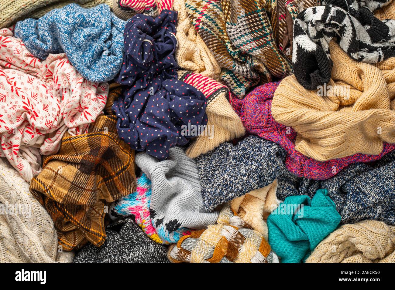 A Bunch of Different Clothes. Recyclable Textile Background. Sorting at