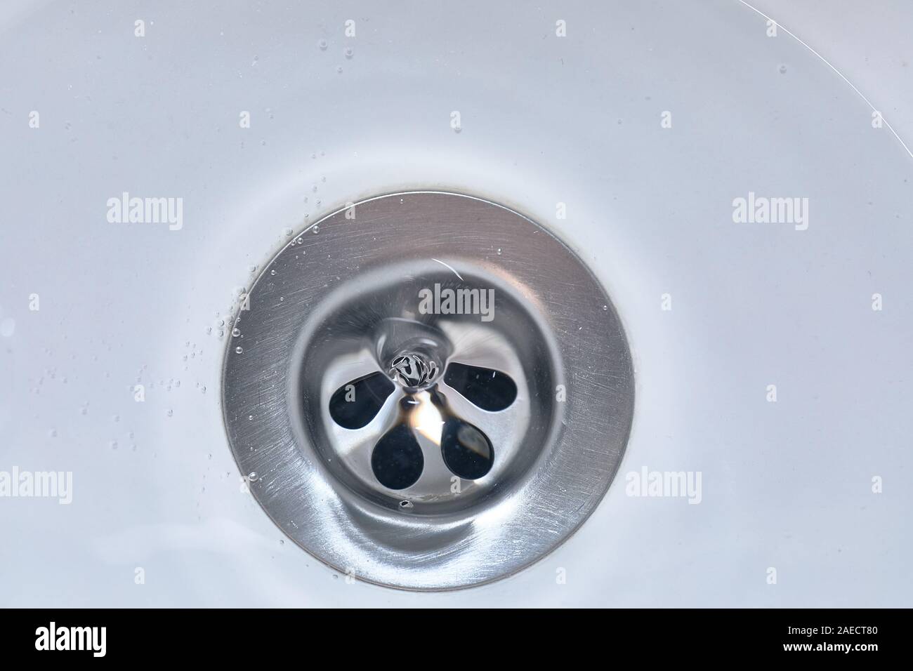 Bathroom sink drain Stock Photo - Alamy