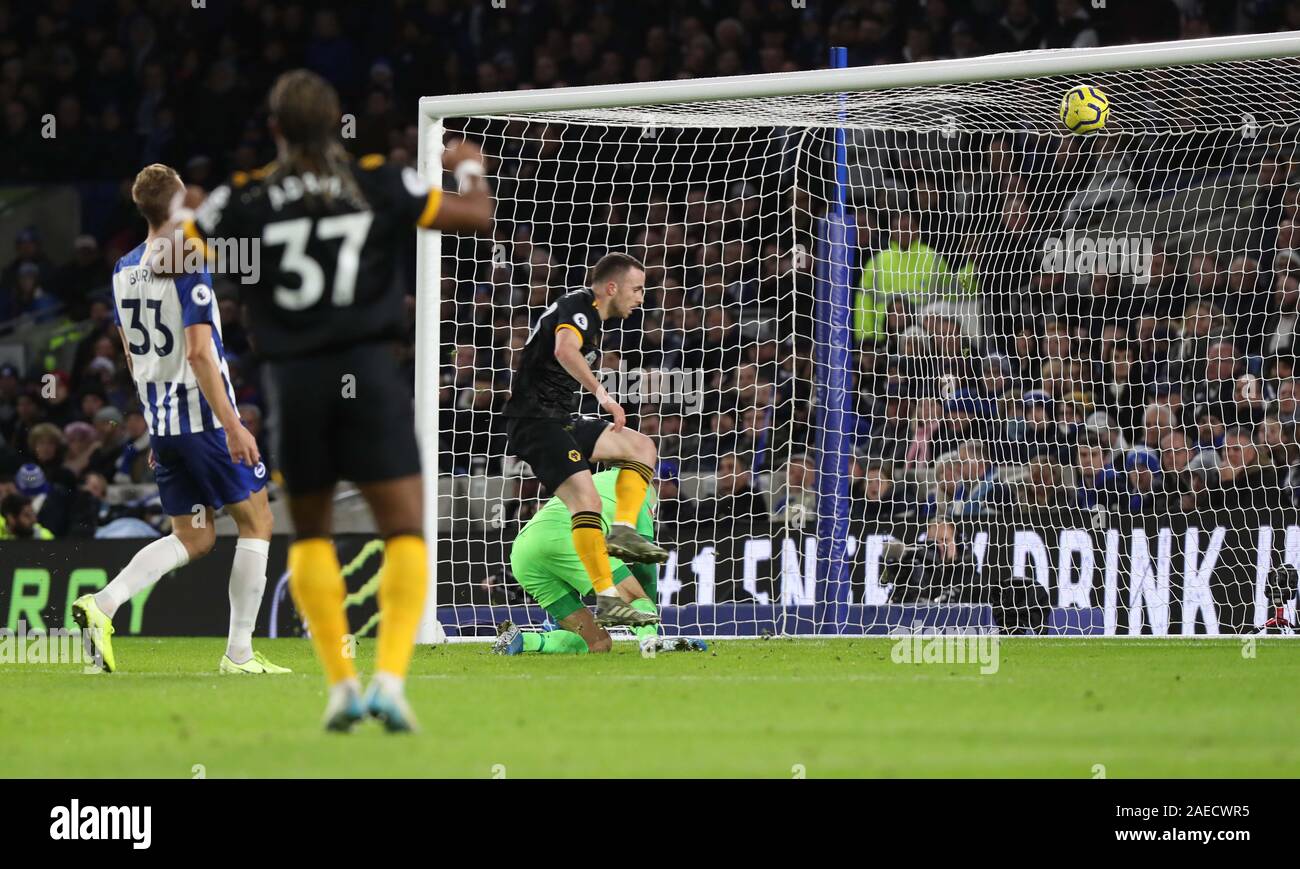 Diogo Jota of Wolves scores the opening goal during the Premier League match between Brighton & Hove Albion and Wolverhampton Wanderers at The Amex Stadium in Brighton. 08 December 2019 Stock Photo