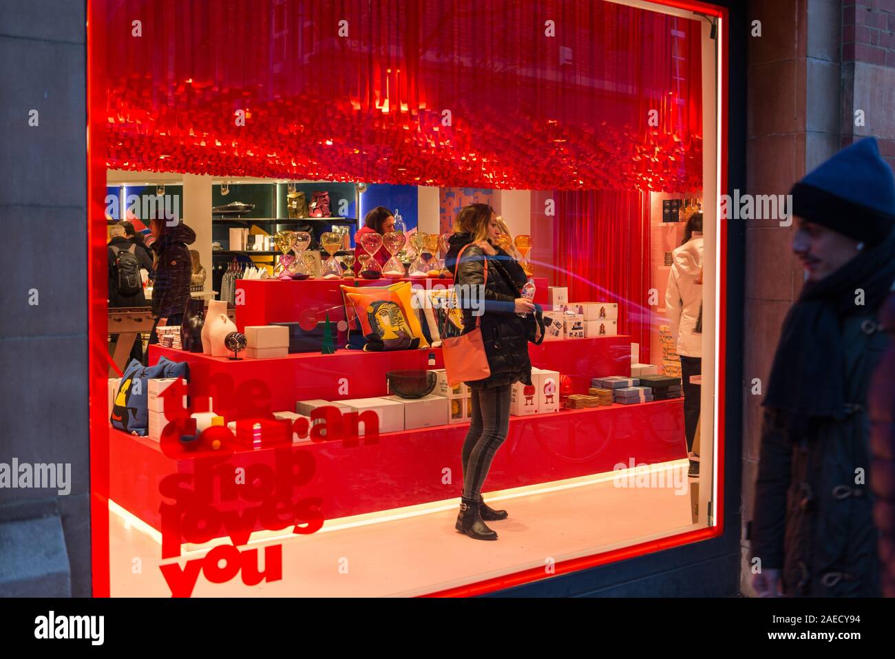 People viewed through the window shopping in The Conran Shop