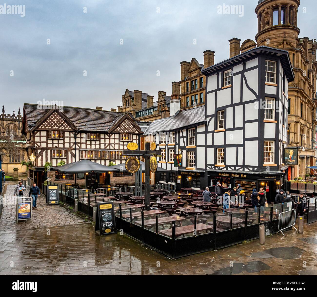 Shambles Square in Manchester, England, created in 1999 around the rebuilt Old Wellington Inn and Sinclair's Oyster Bar next to The Mitre Hotel. Stock Photo