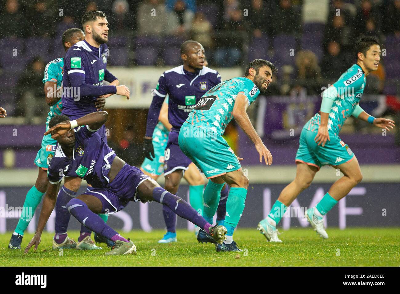 BRUSSELS, BELGIUM - December 08: Jeremy Doku of Anderlecht and Maxime Busi  of Charleroi fight for the ball during the Jupiler Pro League match day 18  between Rsc Anderlecht vs Sporting Charleroi