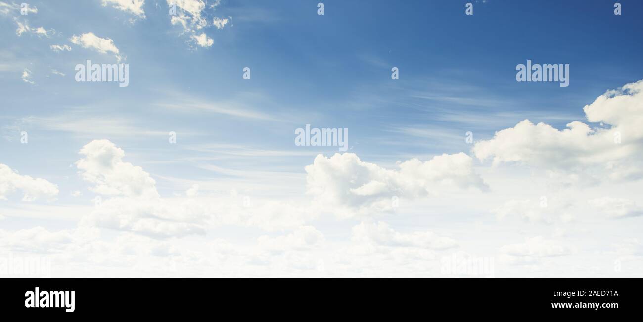 Clear blue sky and white clouds summer background Stock Photo - Alamy