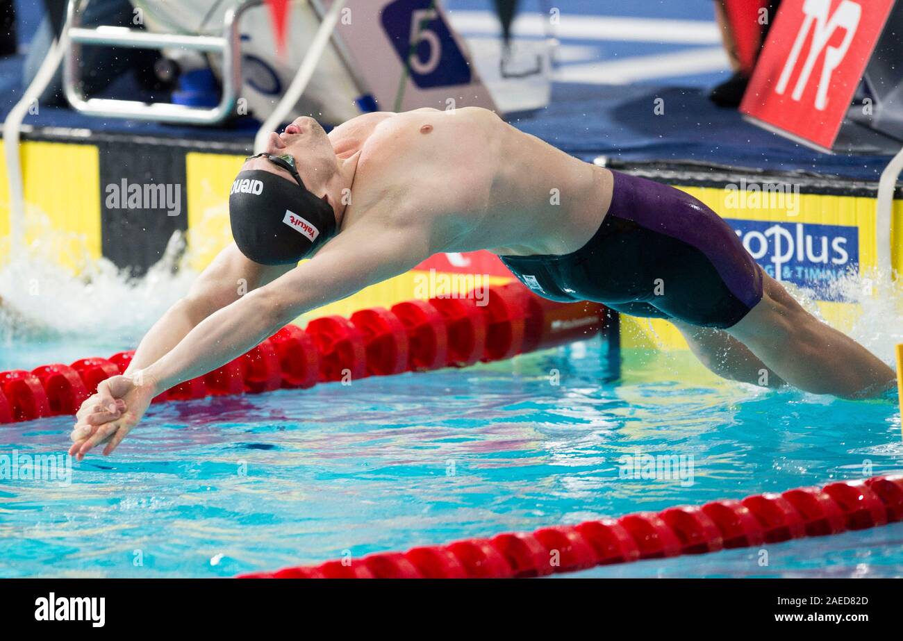 Germany's Christian Diener dives in on the first leg of the Men's 4 x 50m Medley Relay during day five of the European Short Course Swimming Championships at Tollcross International Swimming Centre, Glasgow. Stock Photo