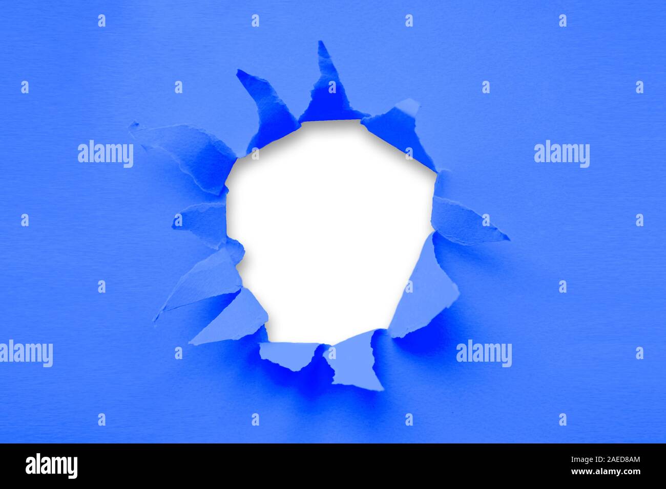Breakthrough paper hole with white background toned with main trendy ...