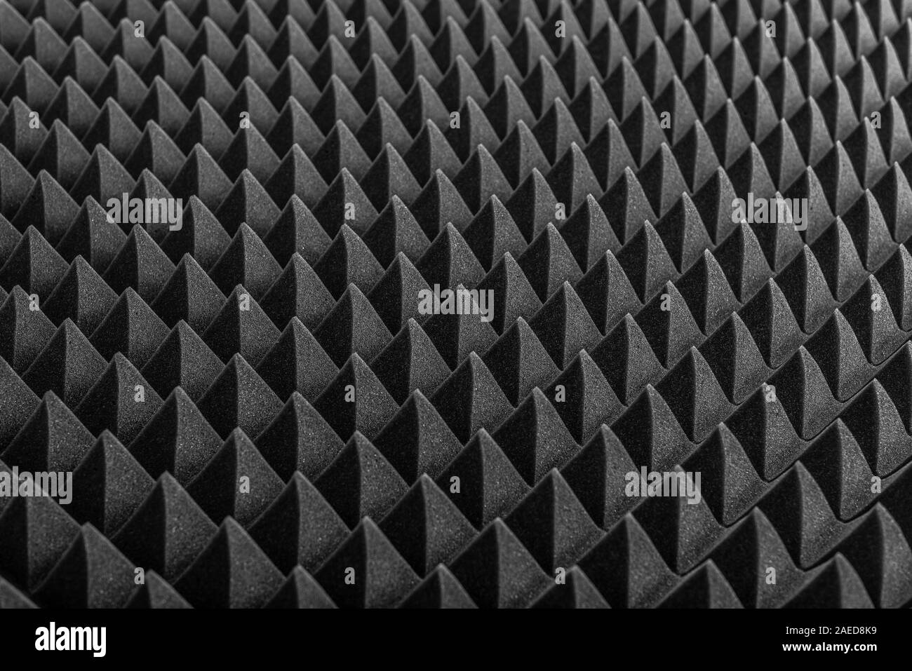 Abstract background in the form of pyramids and dragon scales. Stock Photo