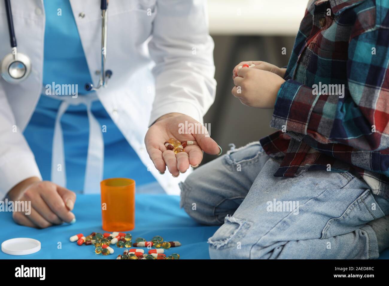 Spilled tablets on table Stock Photo