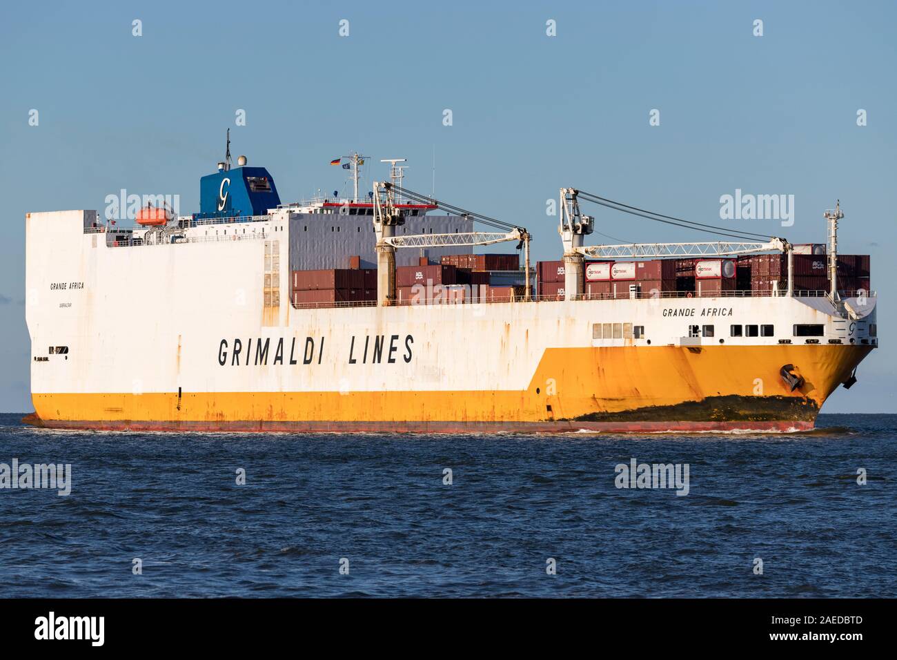 Grimaldi Lines ConRo ship GRANDE AFRICA on the river Elbe. The Grimaldi Group is a private shipping company based in Naples, Italy. Stock Photo