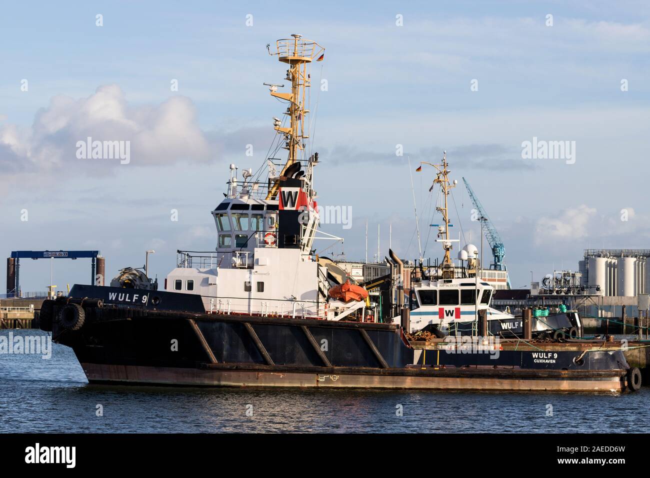 tugboat WULF 9 in the port of Cuxhaven Stock Photo