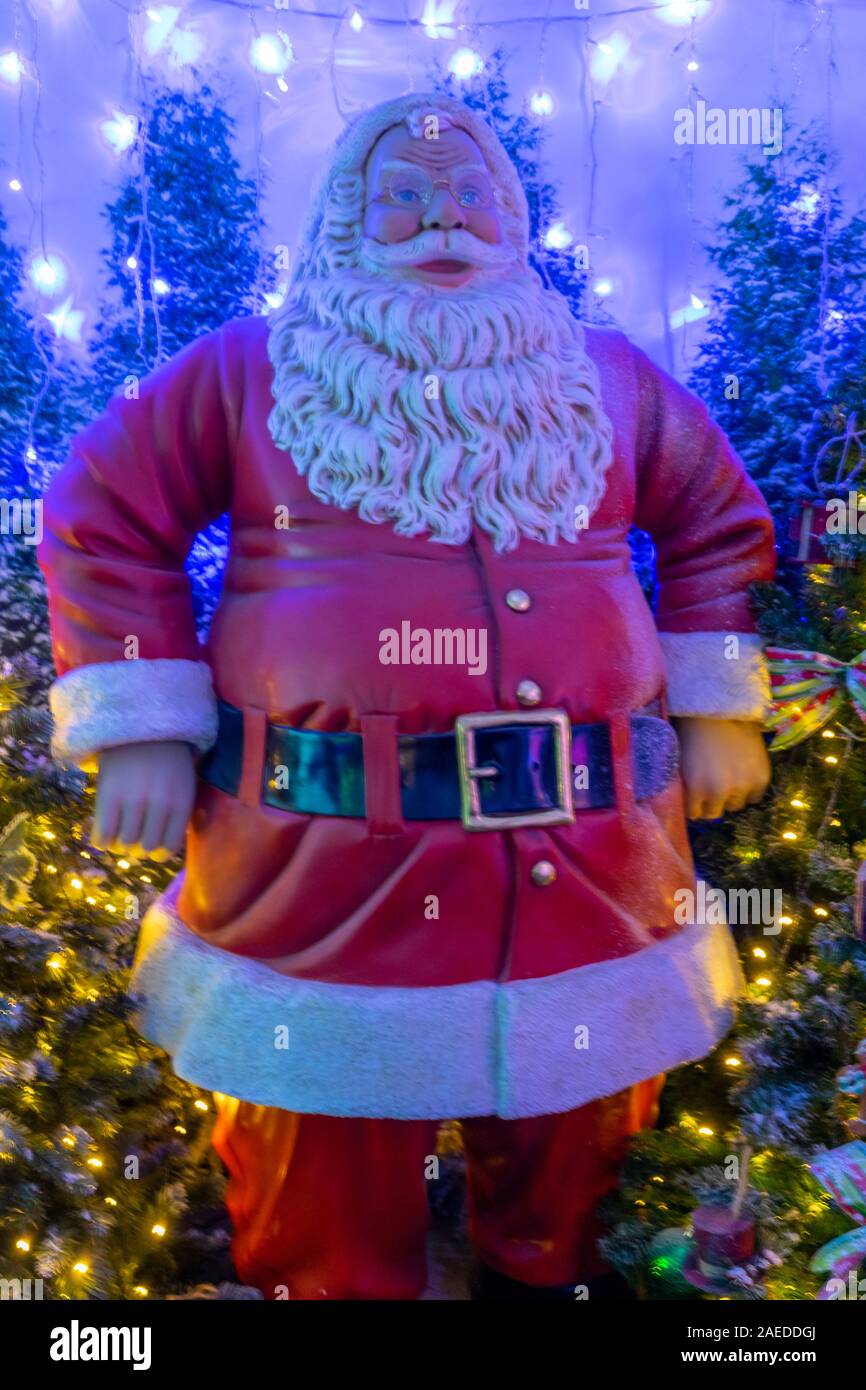 A traditional father Christmas or Santa Clause Christmas decoration statue Stock Photo