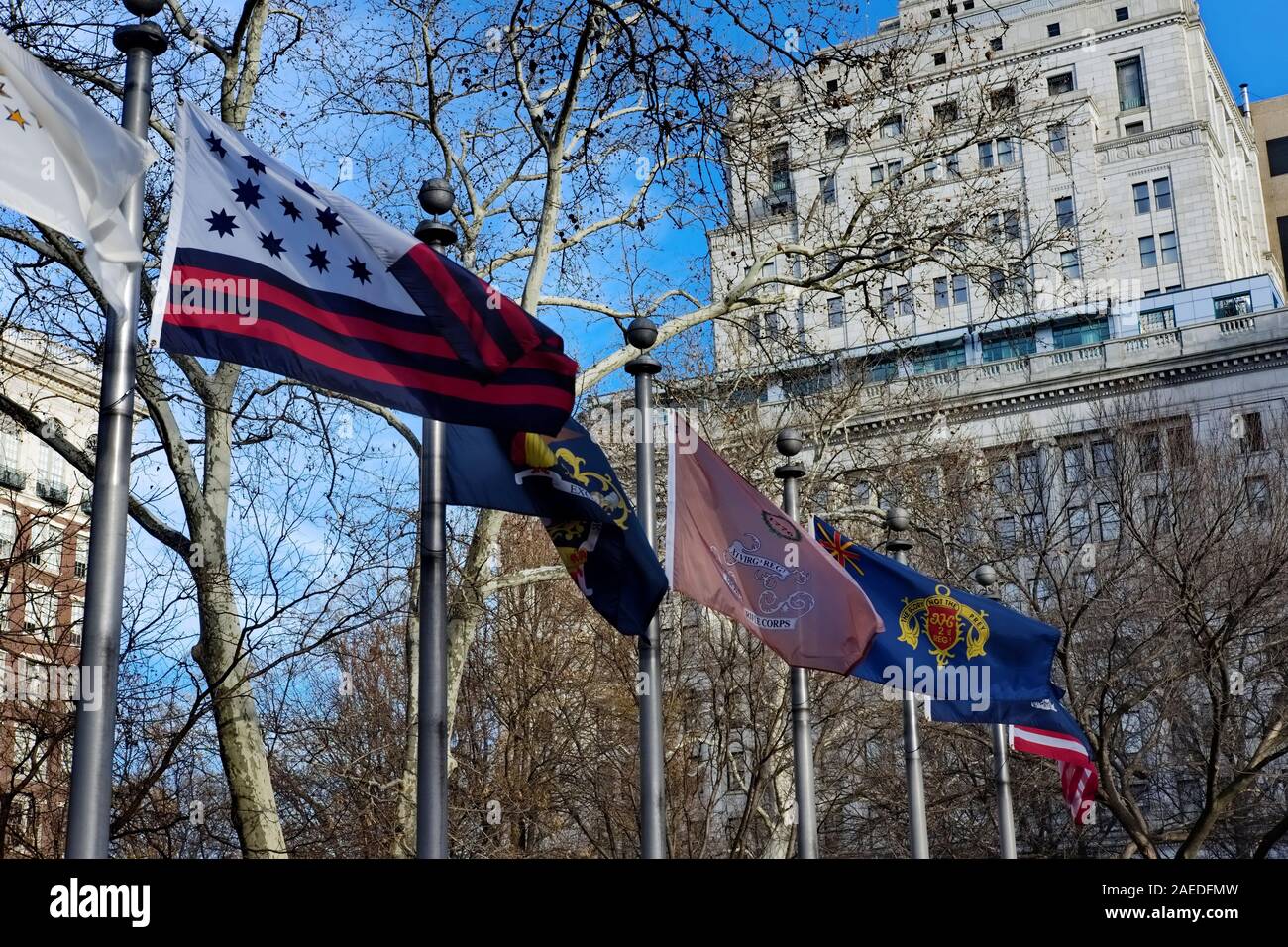 Flags wave on a windy day in Washington Square Park, Philadelphia, PA. Stock Photo
