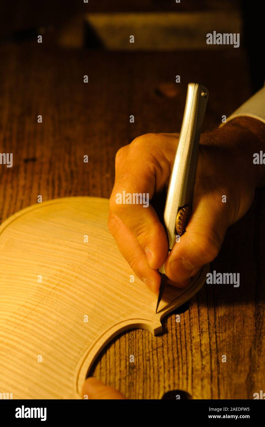 Violin Maker at work Stock Photo