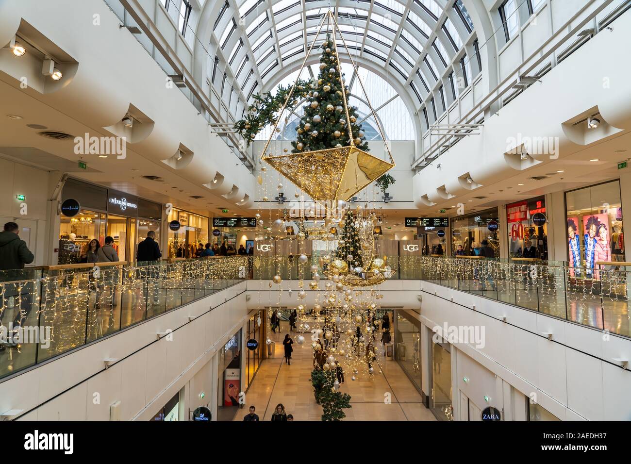 Paris, France - December 8: Parisiens do shopping in Les quatre temps  shopping center with Christmas lights decoratioin put on Stock Photo - Alamy