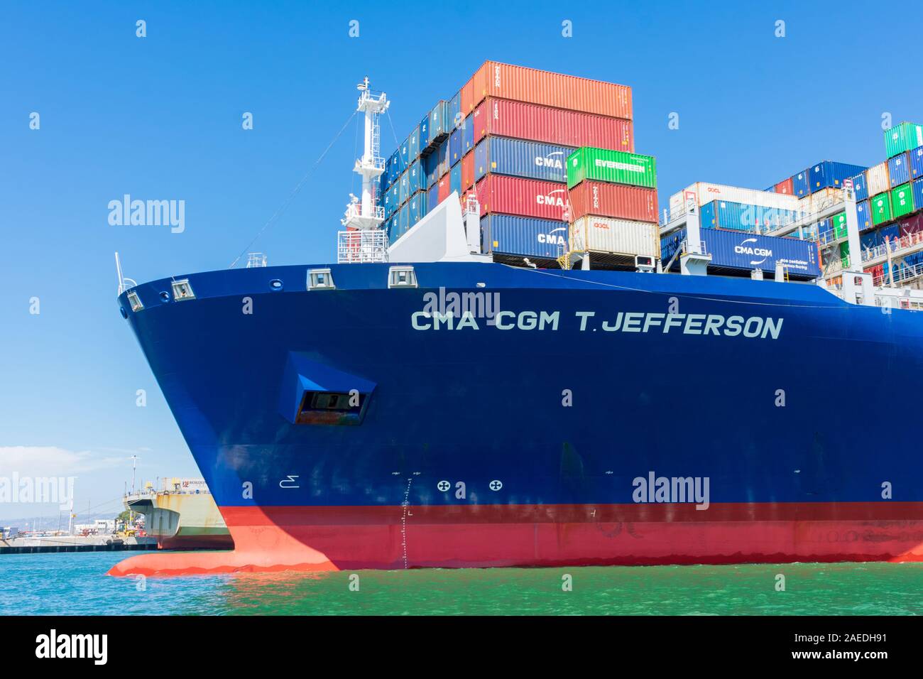 Colorful cargo shipping containers stacked aboard of French container