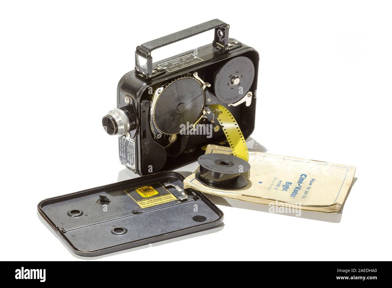 Cine Kodak Eight model 20 8mm film camera from the 1930s. With a roll of 8mm film and instruction book. Amateur camera used in the 1930's and 1940s'. Stock Photo