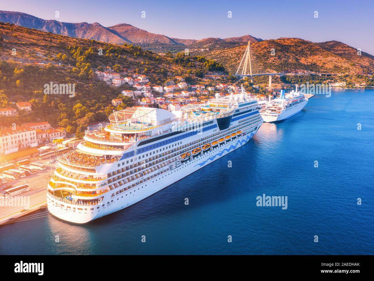Aerial view of beautiful large white cruise ships at sunset Stock Photo