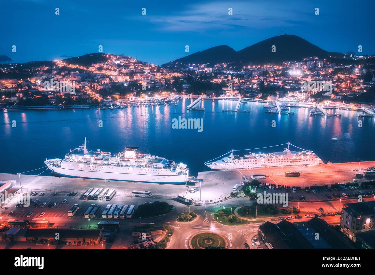 Aerial view of cruise ship in port at night. Landscape Stock Photo