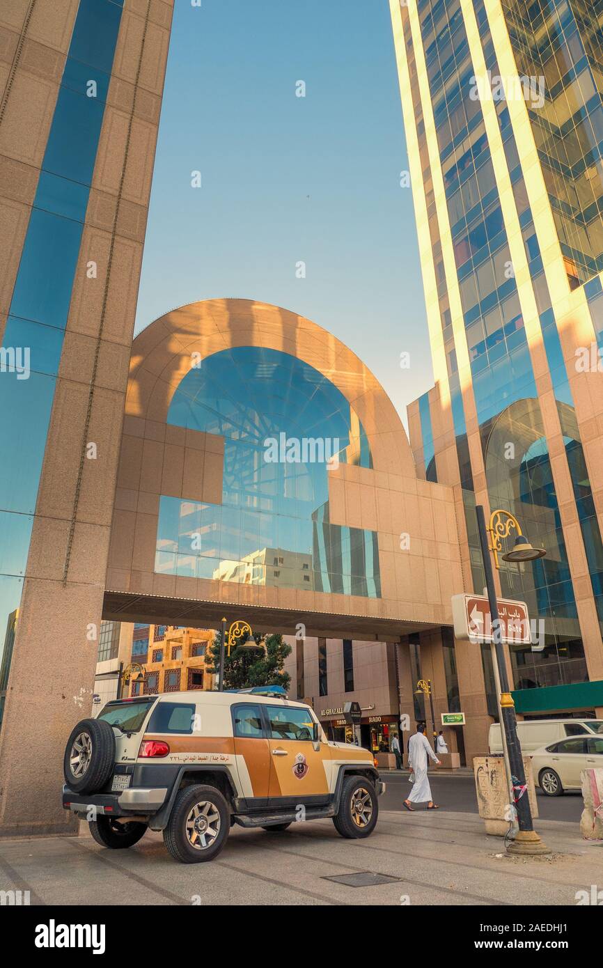 Saudi police cars visibly parked on crucial points throughout the city to ensure the safety of locals, pilgrims and tourists - Al Balad, Jeddah, KSA Stock Photo