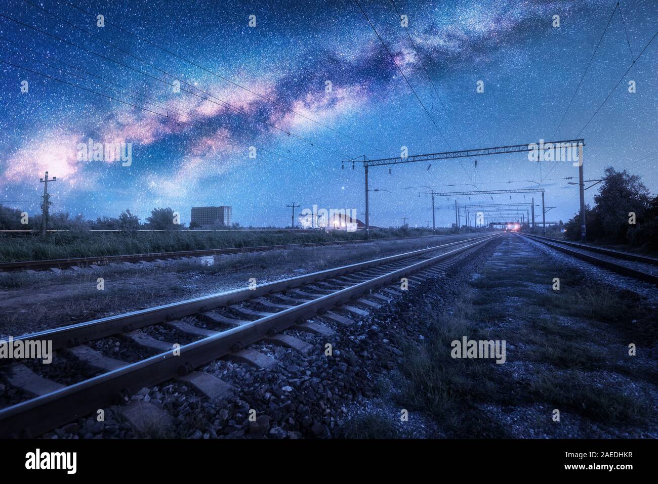 Milky Way over the railway station at starry night Stock Photo - Alamy