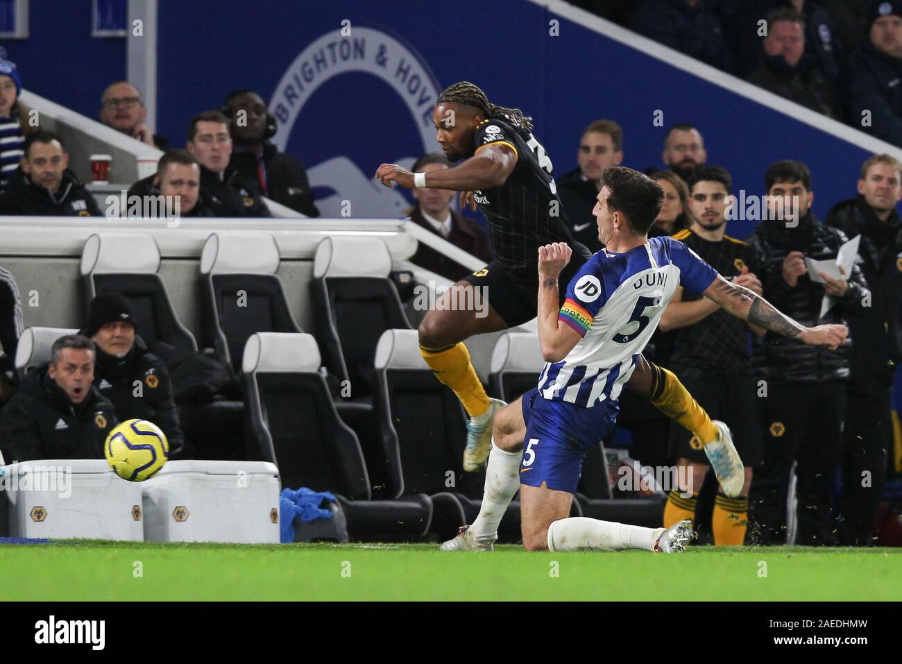 Brighton And Hove, UK. 08th Dec, 2019. Lewis Dunk of Brighton & Hove Albion fouls Adama Traor of Wolverhampton Wanderers and receives a yellow card during the Premier League match between Brighton and Hove Albion and Wolverhampton Wanderers at the American Express Community Stadium, Brighton and Hove, England on 8 December 2019. Photo by Ken Sparks. Editorial use only, license required for commercial use. No use in betting, games or a single club/league/player publications. Credit: UK Sports Pics Ltd/Alamy Live News Stock Photo