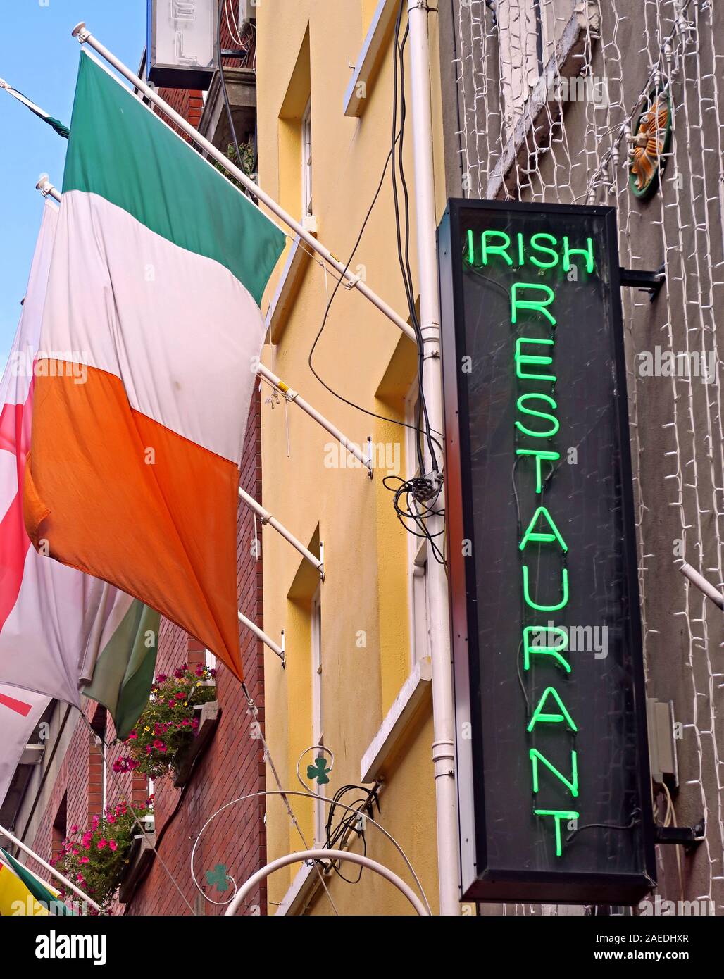 Green Irish Restaurant sign with Ireland flag, Dublin city centre,Irish republic Stock Photo