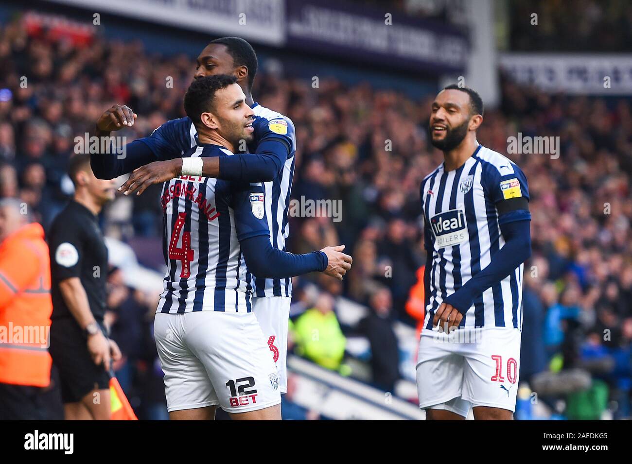 8th December 2019, The Hawthorns, West Bromwich, England; Sky Bet Championship, West Bromwich Albion v Swansea City : Semi Ajayi (6) of West Bromwich Albion, Matt Phillips (10) of West Bromwich Albion celebrate with goal scorer Hal Robson-Kanu (4) of West Bromwich Albion Credit: Gareth Dalley/News Images Stock Photo