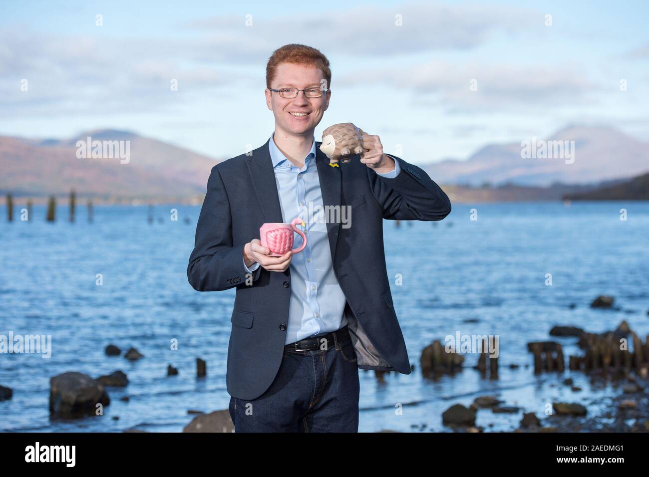 Balloch, UK. 5 November 2019. Pictured: Ross Greer MSP  - Member of the Scottish Parliament for the West Scotland region. Seen at a photo op on the shores of Loch Lomond to highlight the natural beauty of the region and to stop the proposed development of the Flamingo Land theme park.  So far there has been more than 57,000 objections to the plans.   Credit: Colin Fisher/Alamy Live news. Stock Photo