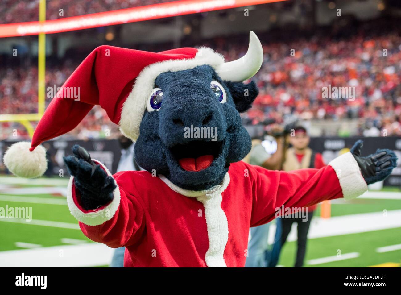 Houston, TX, USA. 8th Dec, 2019. Houston Texans mascot Toro wears a Santa Claus outfit during the 3rd quarter of an NFL football game between the Denver Broncos and the Houston Texans at NRG Stadium in Houston, TX. The Broncos won the game 38 to 24.Trask Smith/CSM/Alamy Live News Stock Photo