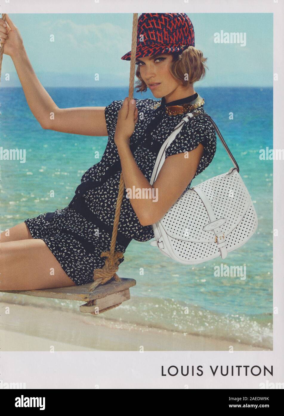 poster advertising Louis Vuitton handbag in paper magazine from 2013 year,  advertisement, creative LV Louis Vuitton advert from 2010s Stock Photo -  Alamy