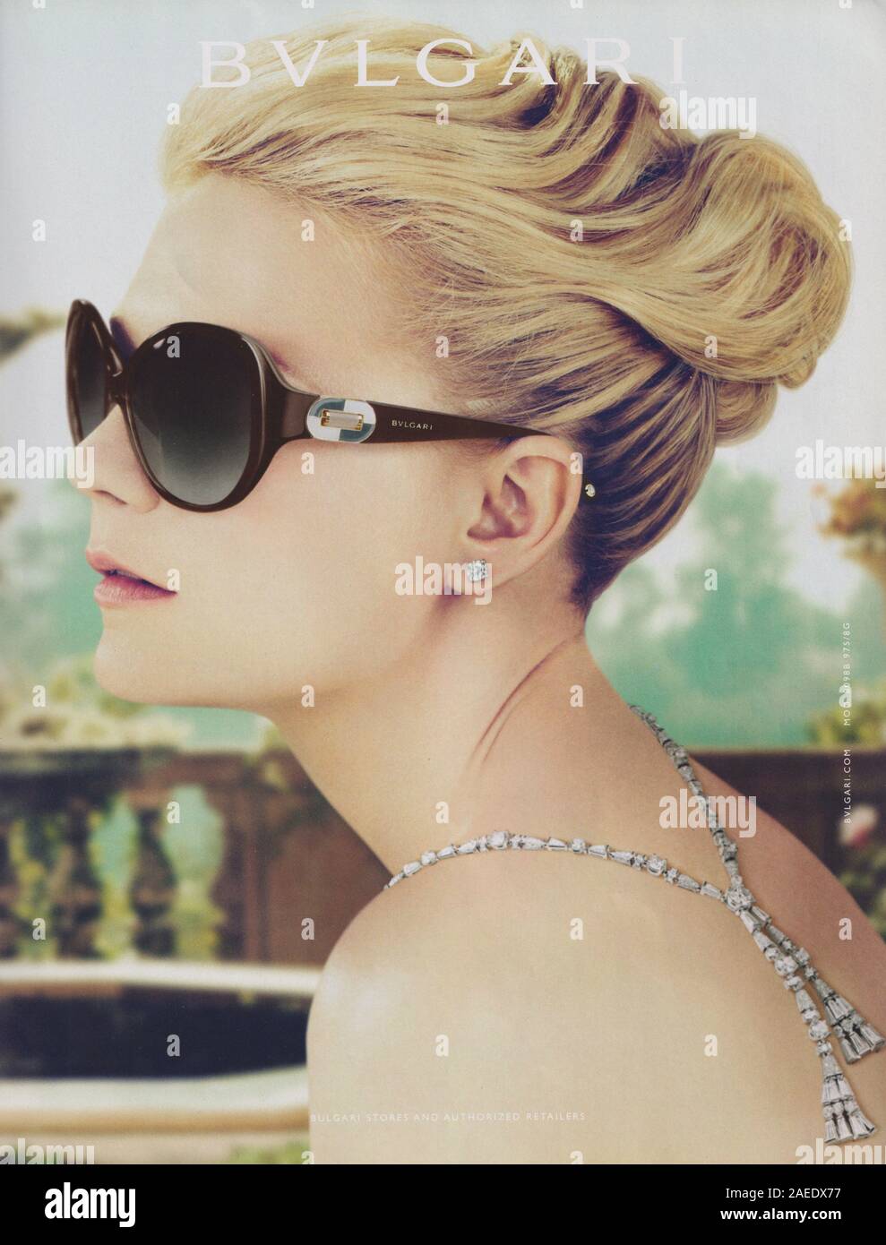 poster advertising BVLGARI fashion house with Kirsten Dunst in paper magazine from 2012 year, advertisement, creative Bulgari advert from 2010s Stock Photo